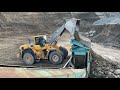 Screening sand and rocks with a Powerscreen Chieftain 1400. Feeding by Volvo 150G Loader