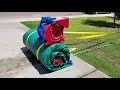 How To Easily Roll Up A Water Slide Inflatable With Dolly Winch - Bounce House