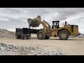 MASSIVE CAT 988 loader processing BIG ROCK!