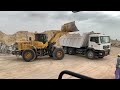 Blacktop Road spelt loading to the truck with Chinese wheel loader