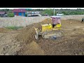 Fantastic Team Operator Bulldozer & Dump Truck Fill The Soil Make  height equal to the national road