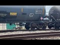 NS engine leads manifest west at tower 87 pulling slowly into englewood yard and meeting bnsf train