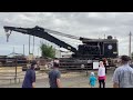 Extended coverage of a steam powered railway crane/derrick.