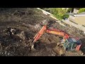 flying the drone round demolished building