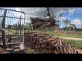 John Deere 1010G Forwarder Unloading firewood