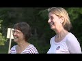 Women with opposing political viewpoints talk outside Virginia voting precinct