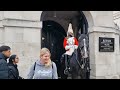 The Armed Police Stand in Front of the Horse Guards and Ask Tourists to 