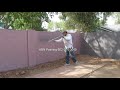 Painting exterior cinder block wall/fence.