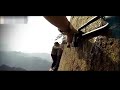 A Man untied safety rope at Mountain HuaShan Plank Trail jump from 2000 meters cliff