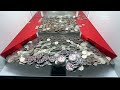 World’s largest poker chip tower inside a High Limit Coin Pusher