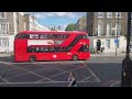 Riding london bus on a new routemaster bus from upstairs front row on Route 27.