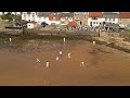 Elie beach ,Cricket game on sand and drone view down beach
