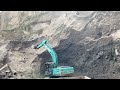 Heavy equipment operators know there will be landslides when mining sand with a Kobelco excavator