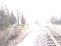 UP freight w/ NS power & John Deer tractors at West Chicago,IL