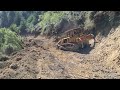 Bulldozing a Track on a Steep Hill with a Caterpillar D5