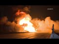 Massive Fire Engulfs Pallet Yard and 10 Freeway in Los Angeles