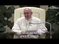 Pope Francis chuckles as boy climbs on stage and interrupts speech