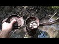 Treasure in the stream. Metal detecting and relic hunting with metal detector.