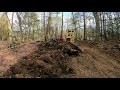 Pushing in a driveway with a bulldozer