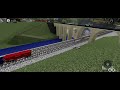 Empty NS tie train rolls under street bridge Ro Scale JA&W