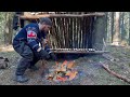 SURVIVAL IN THE WILDLIFE.CONSTRUCTION OF A SHELTER WITH PROTECTION FROM WILD ANIMALS.SOLO BUSHCRAFT