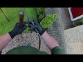 POV - Fertilising and weed-spraying a lawn