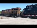 UP 7493 leads a speedy manifest north through Arabi, GA