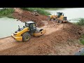 Motor grander , SHANTUI Bulldozer , Roller , and Heavy dump trucks working to construct New Roads