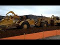 CAT 637E Scrapers push pull close up - Amazing Sound and Power