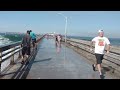 Big wave wets tourist funny