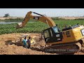 Bulldozer stuck in deep mud & recovery by Excavator