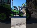 garbage truck packing heavy green waste san jose California