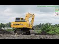 Komatsu PC210 Excavator Digging River Sedimentation