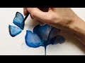 Easy watercolor painting. Blue flower and butterfly