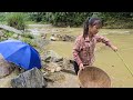 Vietnamese girl fishing for giant fish in Vietnam - ha thi muon