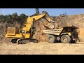 Cat 6020B - The Biggest Hydraulic Mining Shovels loading Cat 777E Off-Highway Trucks in Vietnam