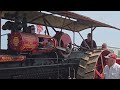 Steam engine threshing with  Tony  B. at the  controls.