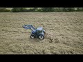 Sam Baling hay for John, at former gas drill rig site