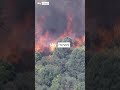 Thousands flee as wildfire explodes in size