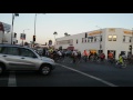 Human beings riding bikes down Melrose (Critical Mass)