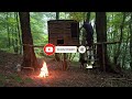 Building wood survival shelter in wildlands / bushcraft  / campfire