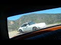 Datsun 510 leading Porsche down Tuna Canyon 3 of 3