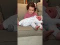 Leah holds Tyler for the first time