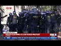 UC San Diego protestors seen being taken into police custody.