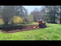 Kubota B5100d tilling the garden.