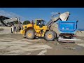 Wheel loader VOLVO L180H loading dump truck