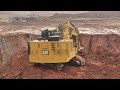 300 ton Cat 6020B Excavator Loading Trucks