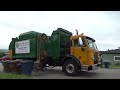 A Peterbilt 320 McNeilus ZR doing some heavy recycle