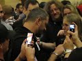 Chris Metzen autographing a fan.