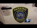 Photo catches parking checker parked in handicapped spot